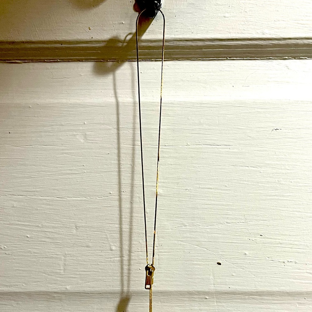 Vintage Gold zipper necklace.